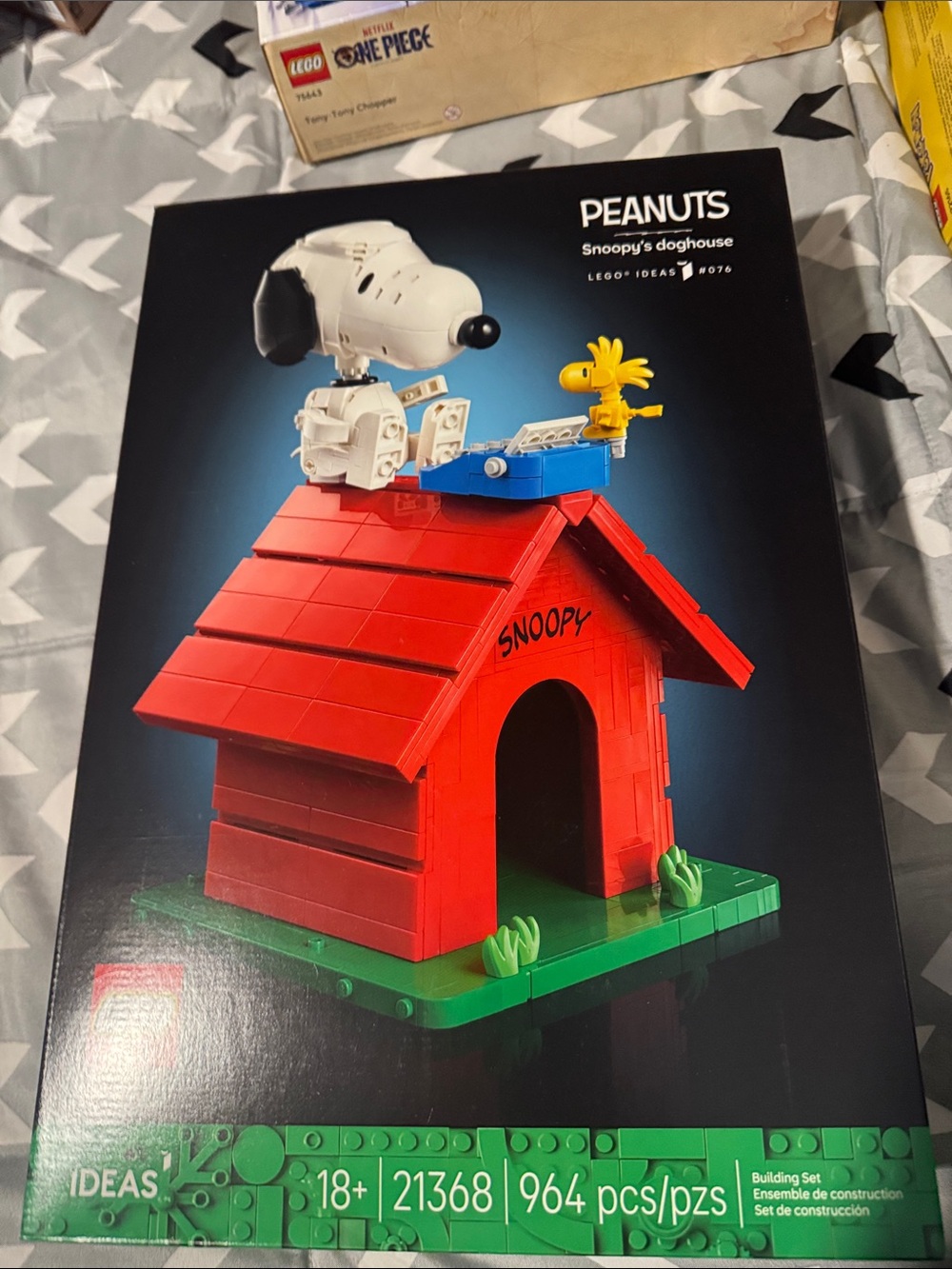 Peanuts Red & Green Snoopy Doghouse Plush-Style Pet Bed